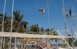 Exclusively gay Club Atlantis Cancun at Club Med resort Flying Trapeze