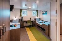 Ortelius porthole twin cabin