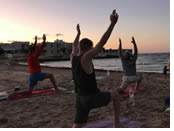 Gay yoga holiday on the beach